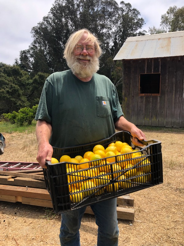 Andy with tote of lemons